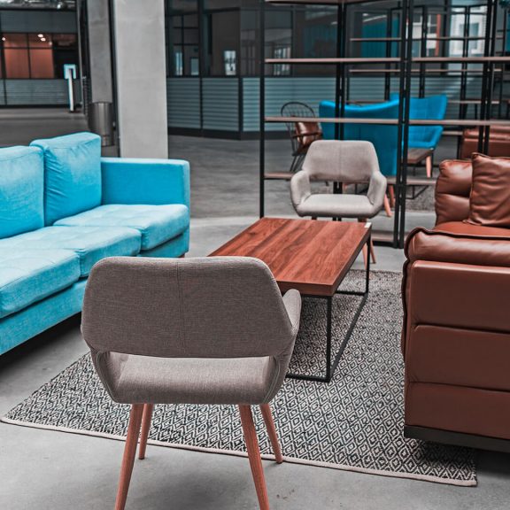 Modern office couch and sofa in blue and brown colors